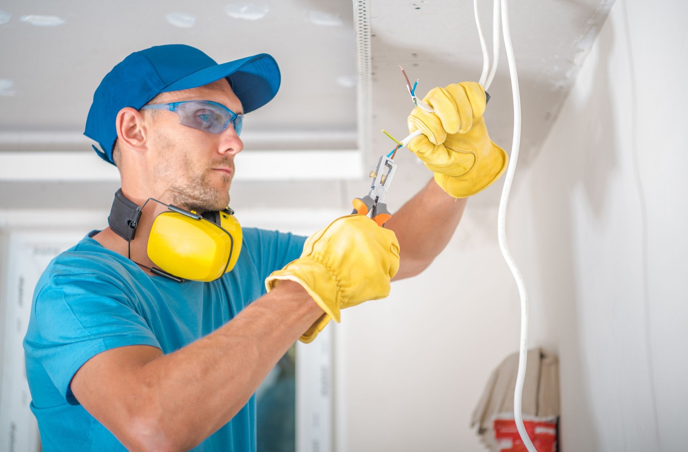 person fitting electric wires